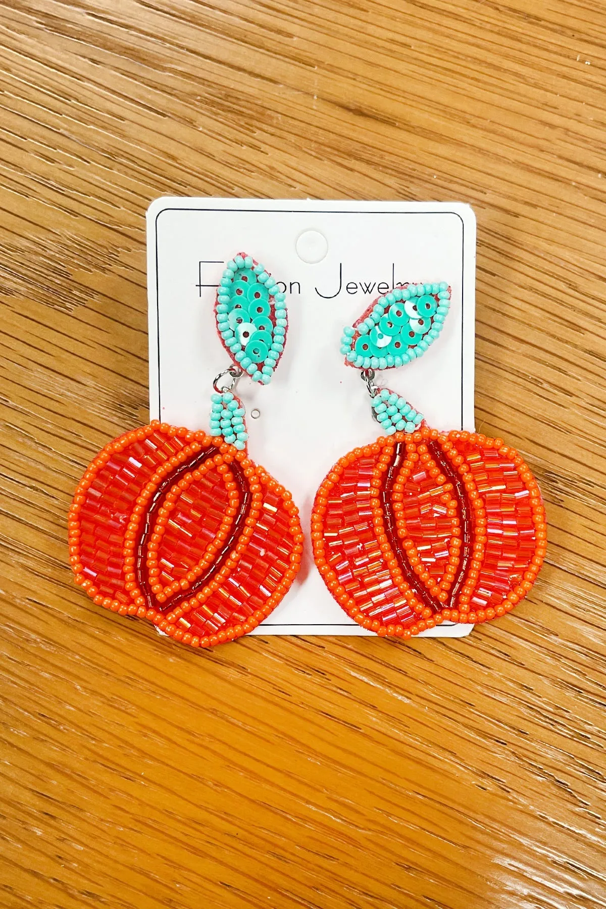 Pumpkin Bead Halloween Earings sold by Charming Charlie product image thumbnail 2