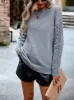 Cable knit sleeve sweater sold by Charming Charlie