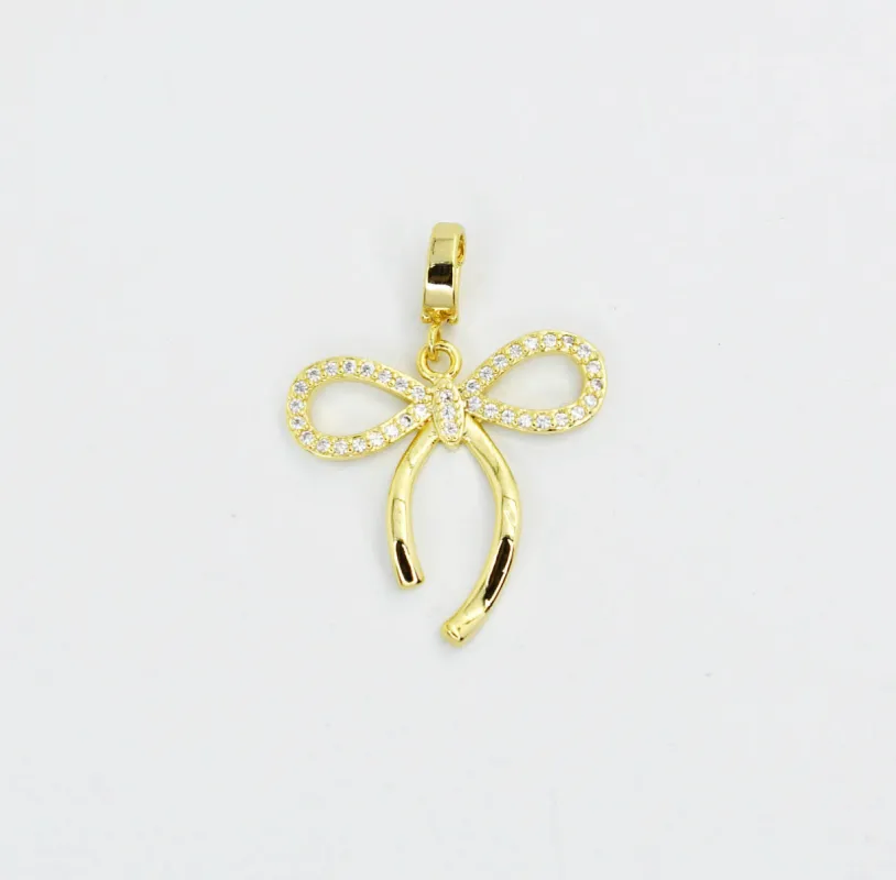 Bow Tie Gold Charm sold by Charming Charlie