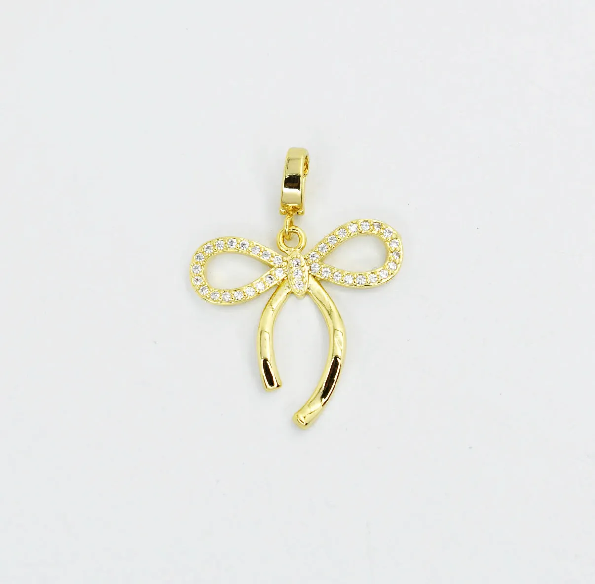 Bow Tie Gold Charm sold by Charming Charlie