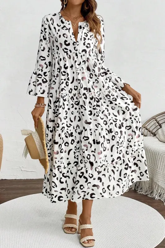 Tiered Leopard Notched Three-Quarter Sleeve Dress sold by Charming Charlie