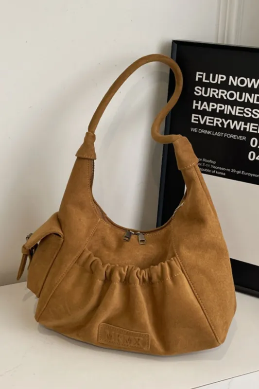 Ruched Suede Handbag with Zipper sold by Charming Charlie