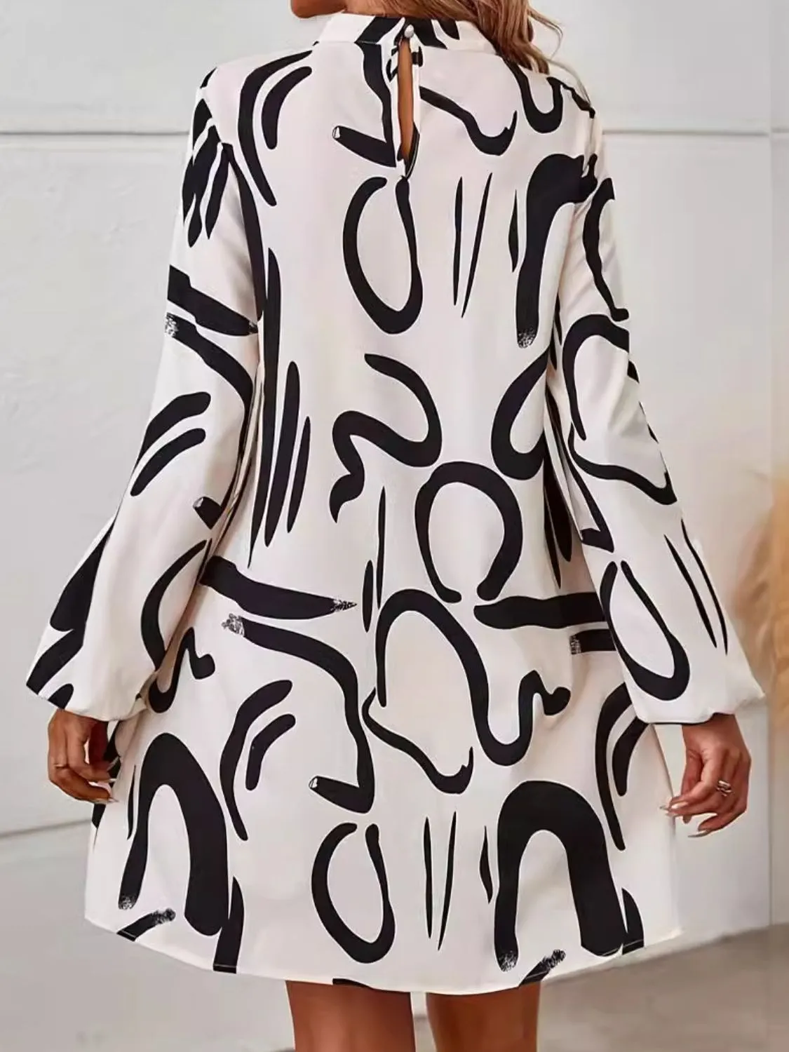 Printed Mock Neck Long Sleeve Mini Dress sold by Charming Charlie product image thumbnail 3