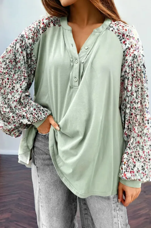 Printed Notched Long Sleeve Blouse sold by Charming Charlie