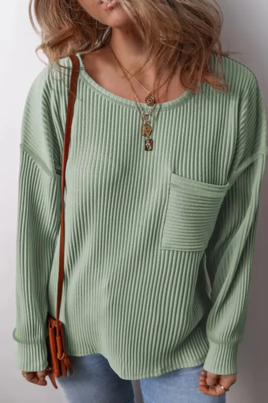 Plus Size Pocketed Ribbed Round Neck Long Sleeve Top sold by Charming Charlie