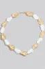 Fame Synthetic Pearl and Metallic Beaded Necklace sold by Charming Charlie