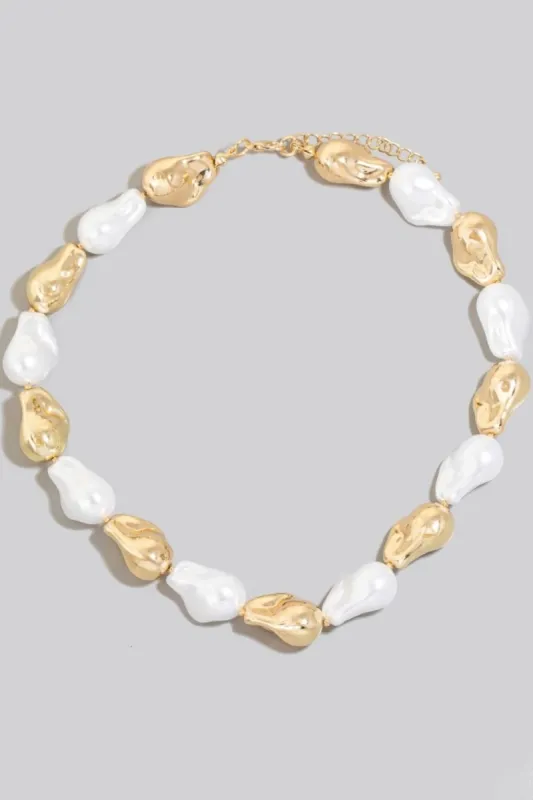 Fame Synthetic Pearl and Metallic Beaded Necklace sold by Charming Charlie