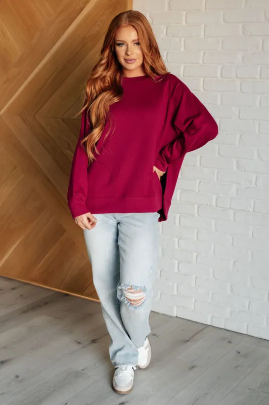It's The Little Things Relaxed Scuba Pullover in Cabernet sold by Charming Charlie