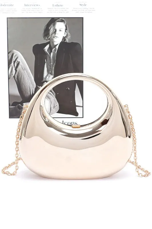 Polished Molded Top Handle Clutch sold by Charming Charlie