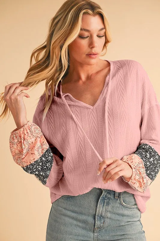 Floral Patchwork Textured Drawstring V Neck Top sold by Charming Charlie