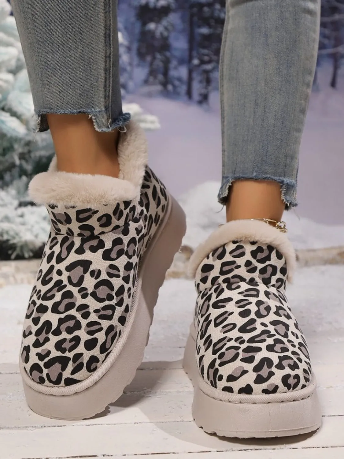 Thermal Leopard Round Toe Platform Boots sold by Charming Charlie