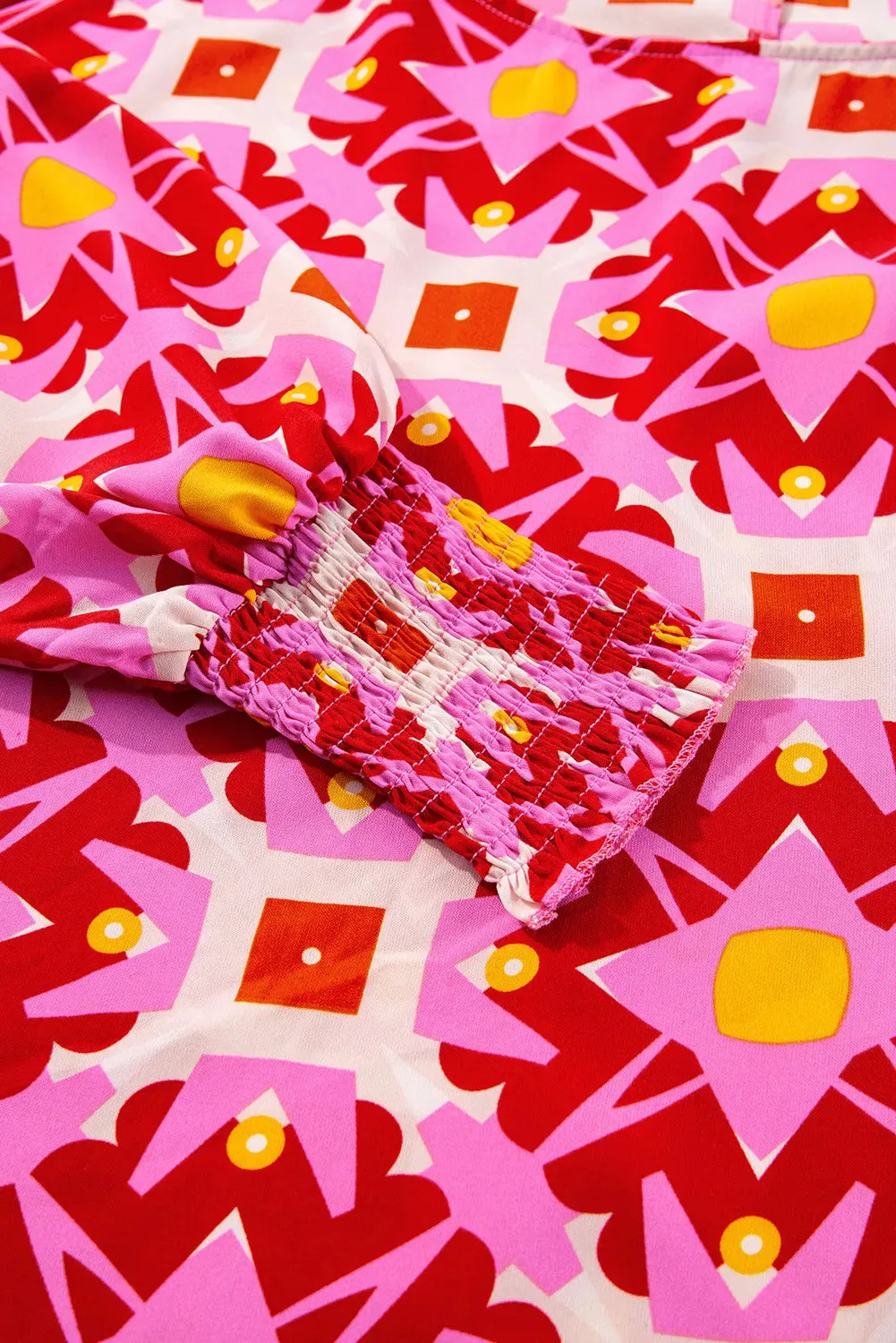 Smocked Cuff Printed Round Neck Long Sleeve Blouse sold by Charming Charlie product image thumbnail 4