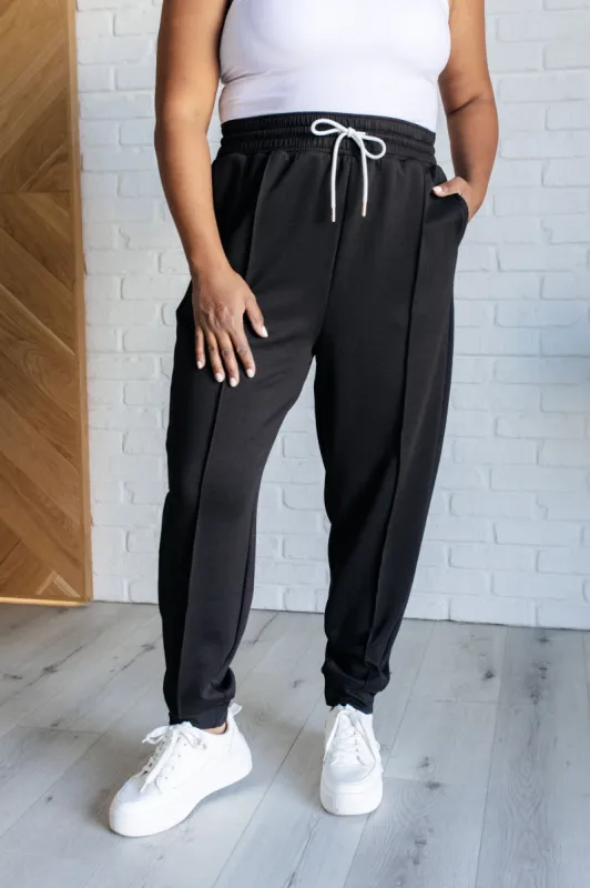 Center Seam Scuba Joggers in Black sold by Charming Charlie