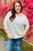 Spread Joy Grey & Ivory Striped Oversized Top sold by Charming Charlie