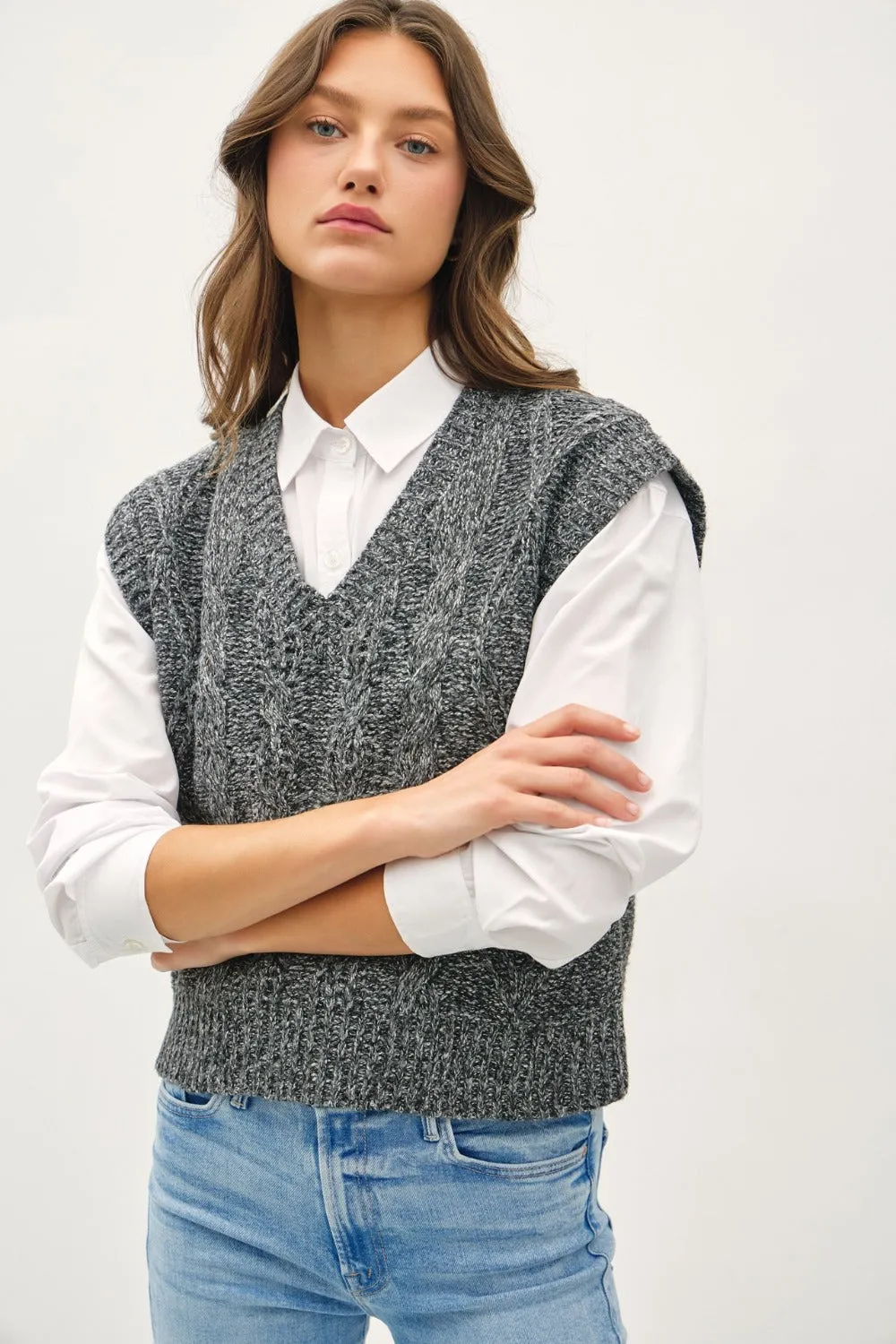 Be Cool Cable Knit V-Neck Sweater Vest sold by Charming Charlie