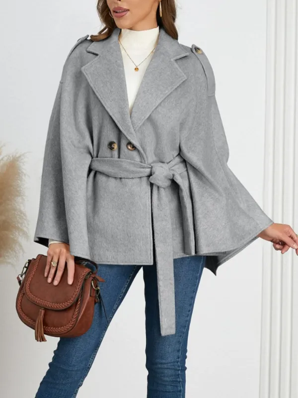 Double-Breasted Tie Waist Poncho sold by Charming Charlie