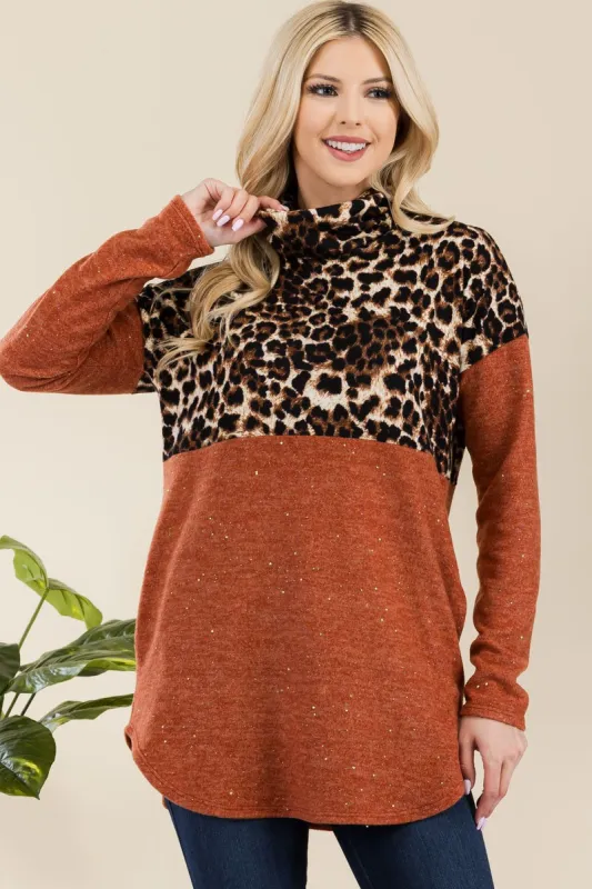 Celeste Full Size Curved Hem Leopard Turtleneck Long Sleeve Blouse sold by Charming Charlie