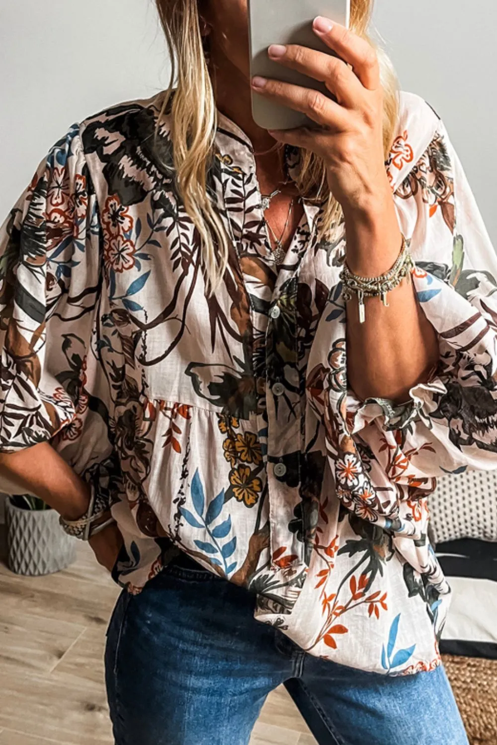 Printed Notched Flounce Sleeve Blouse sold by Charming Charlie