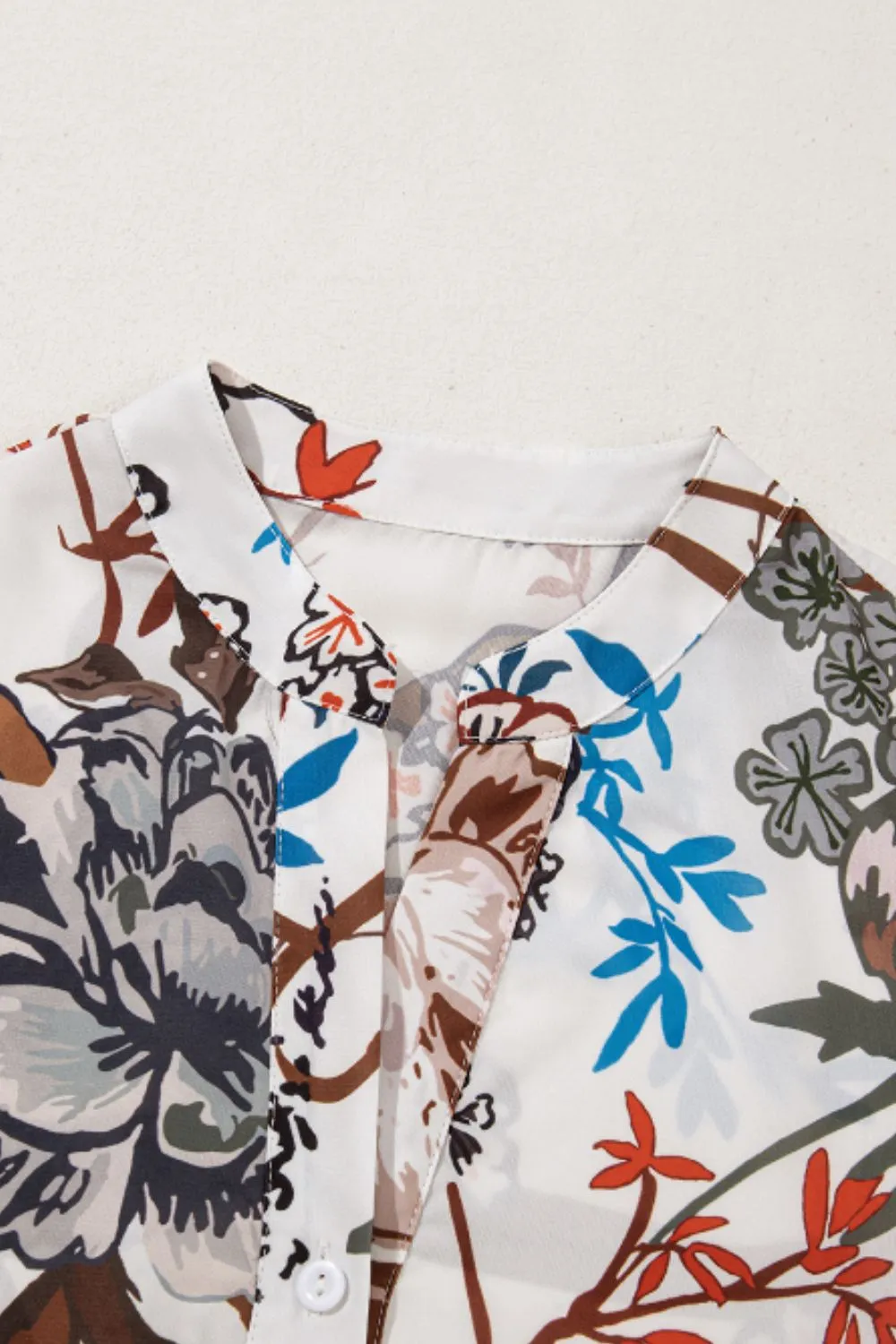 Printed Notched Flounce Sleeve Blouse sold by Charming Charlie product image thumbnail 5