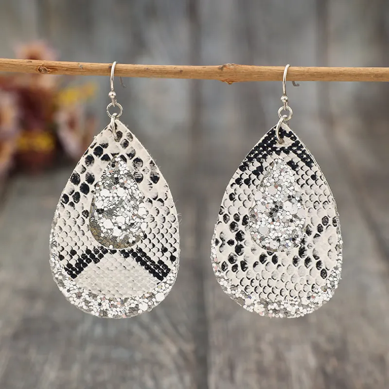 PU Leather Sequin Teardrop Earrings sold by Charming Charlie