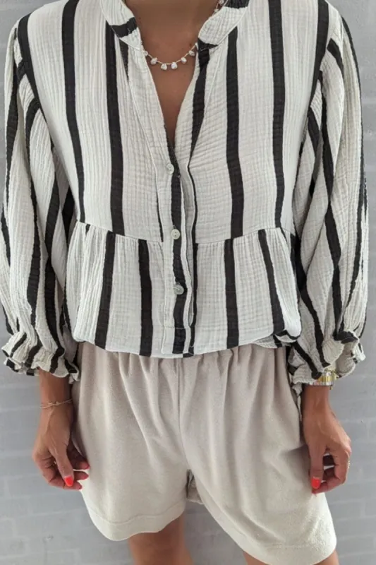 Striped Notched Three-Quarter Sleeve Blouse sold by Charming Charlie