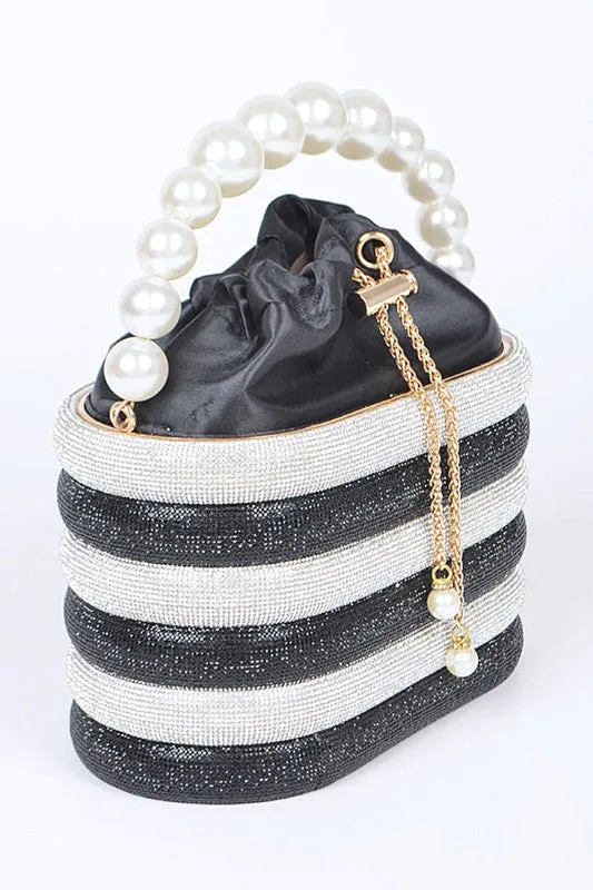 Pearl Handle Rhinestone Statement Bucket Clutch sold by Charming Charlie