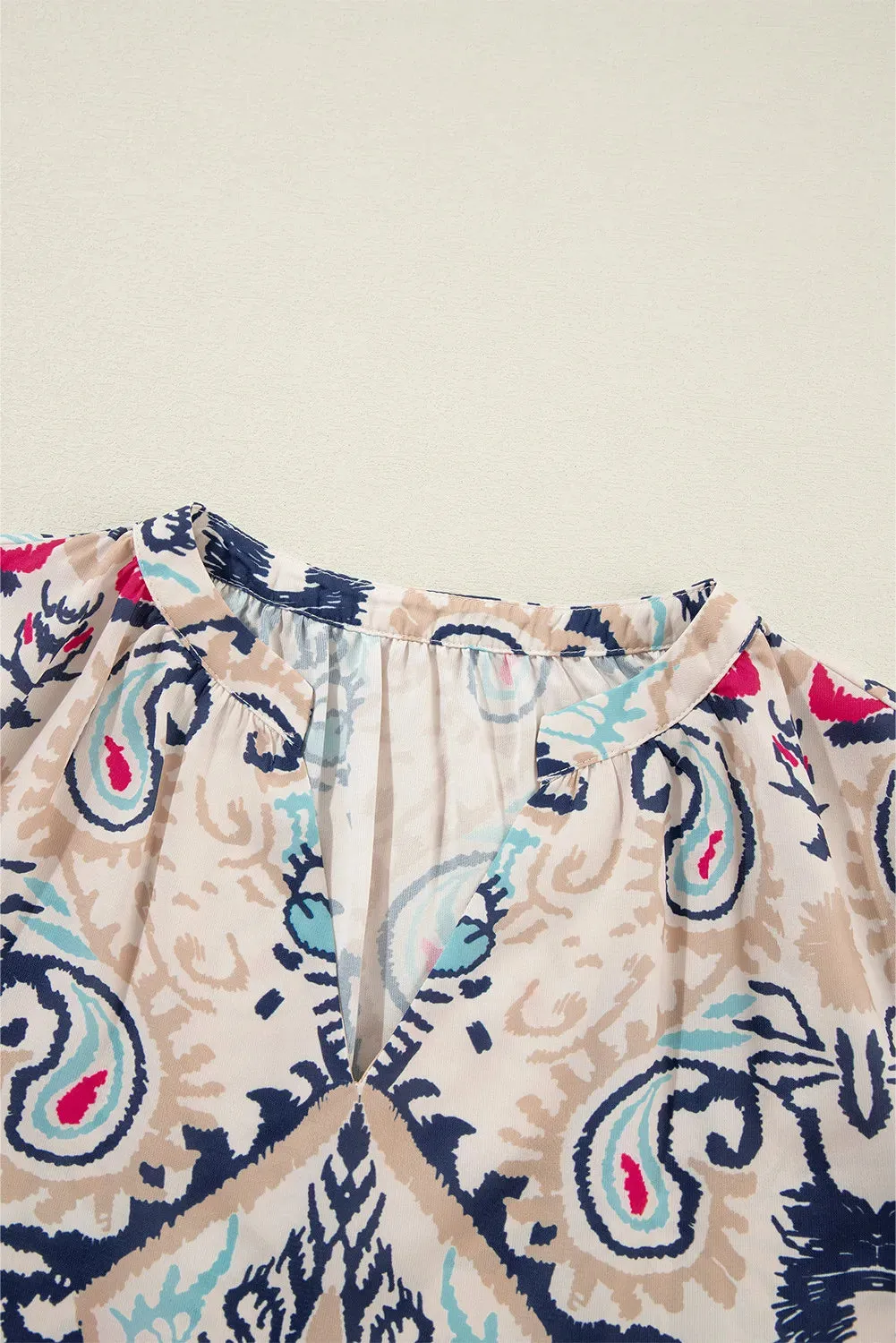 Printed Notched Half Sleeve Blouse sold by Charming Charlie product image thumbnail 4