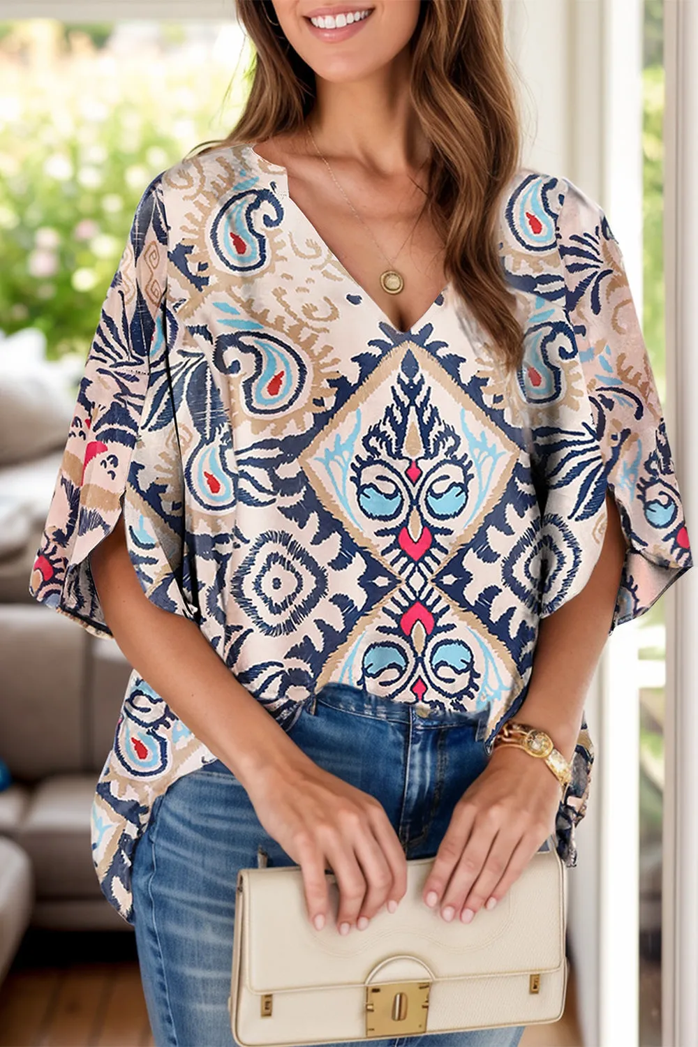 Printed Notched Half Sleeve Blouse sold by Charming Charlie