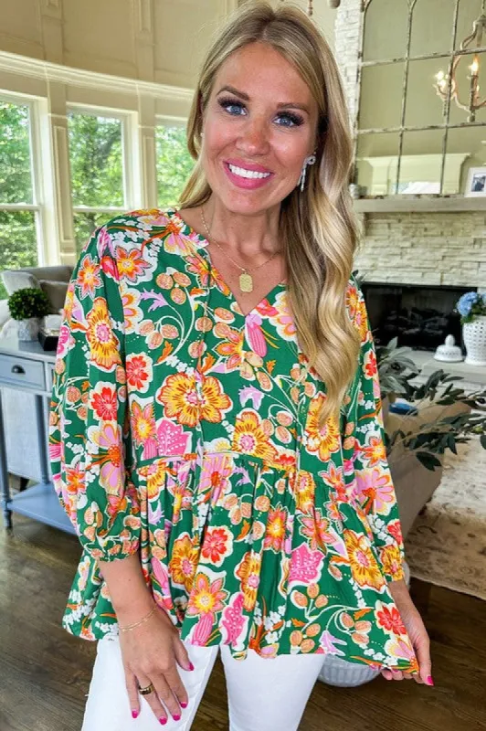 Green Floral Puff Sleeve V Neck Peplum Blouse sold by Charming Charlie