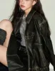 Faux leather bow biker jacket sold by Charming Charlie