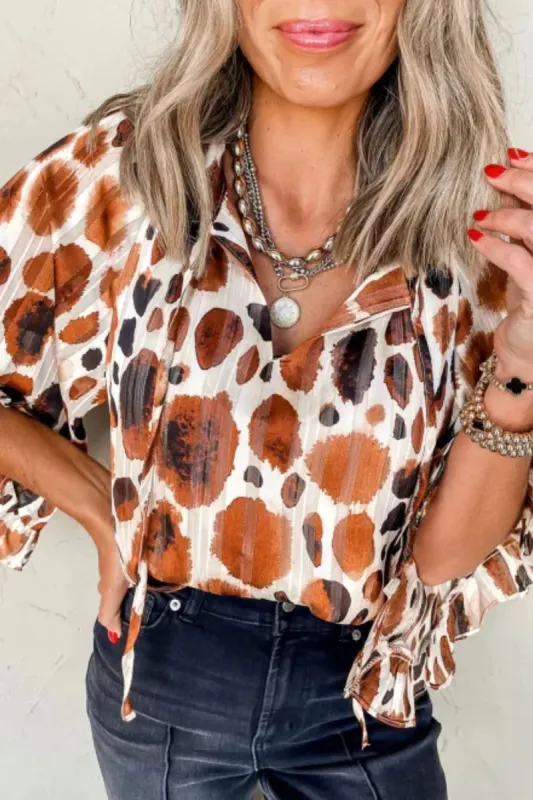 Printed Tie Neck Three-Quarter Sleeve Blouse sold by Charming Charlie