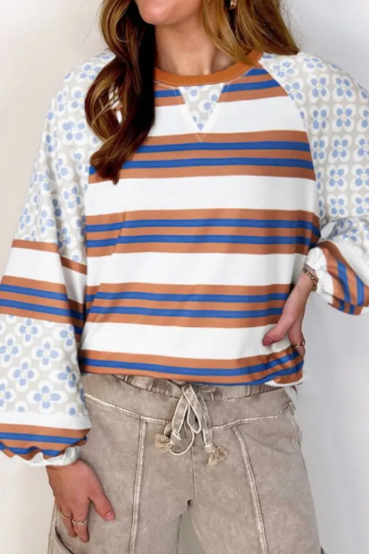 Contrast Stripes Round Neck Raglan Sleeve Sweatshirt sold by Charming Charlie