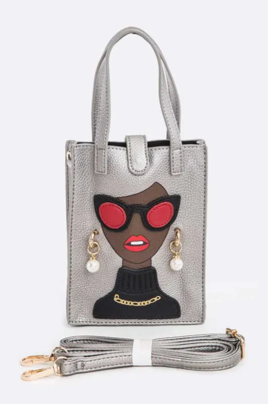 Lady In Glasses Top Handle Convertible Swing Bag sold by Charming Charlie