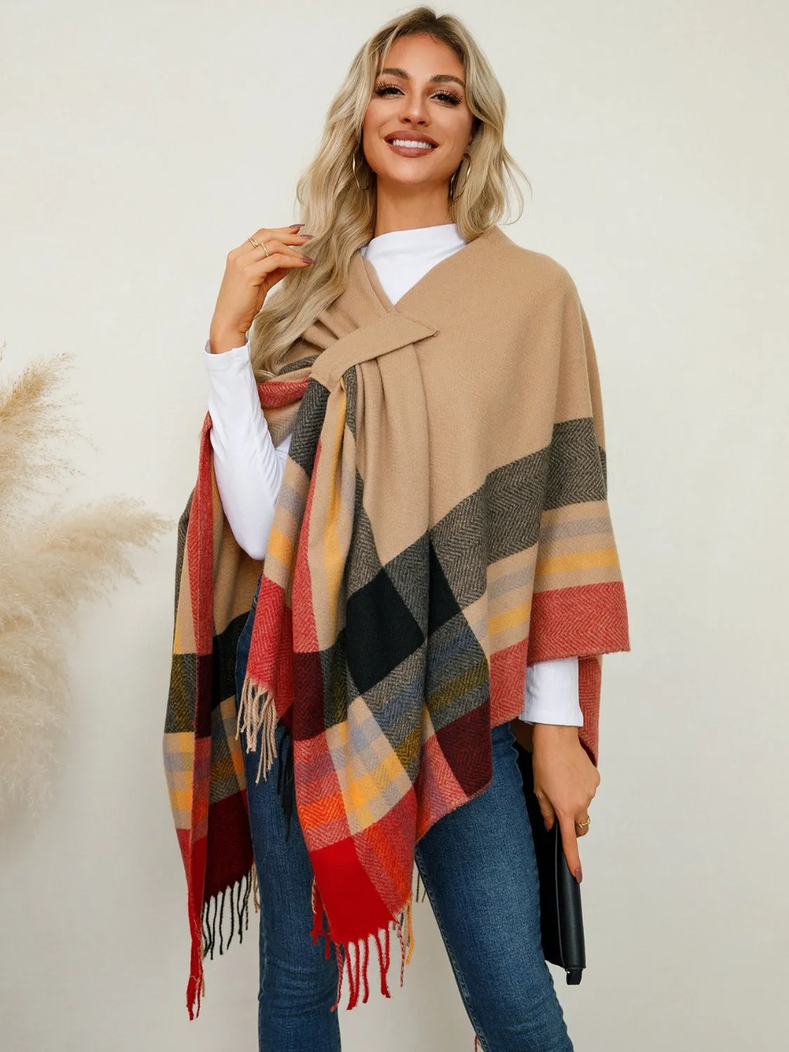 Fringe Contrast Plaid Poncho sold by Charming Charlie
