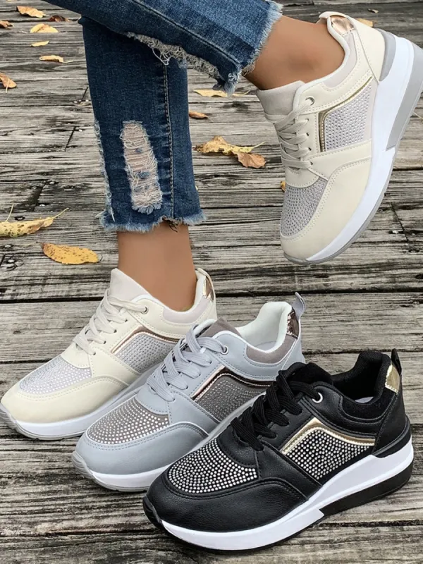 Lace-Up Rhinestone Wedge Sneakers sold by Charming Charlie