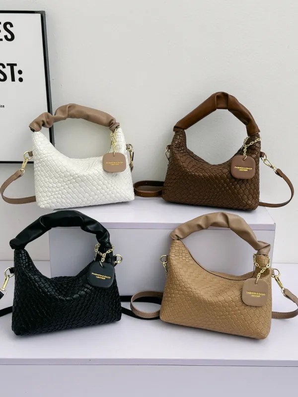 PU Leather Woven Crossbody Bag sold by Charming Charlie