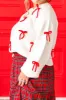 Bow Trim Round Neck Long Sleeve Sweater sold by Charming Charlie