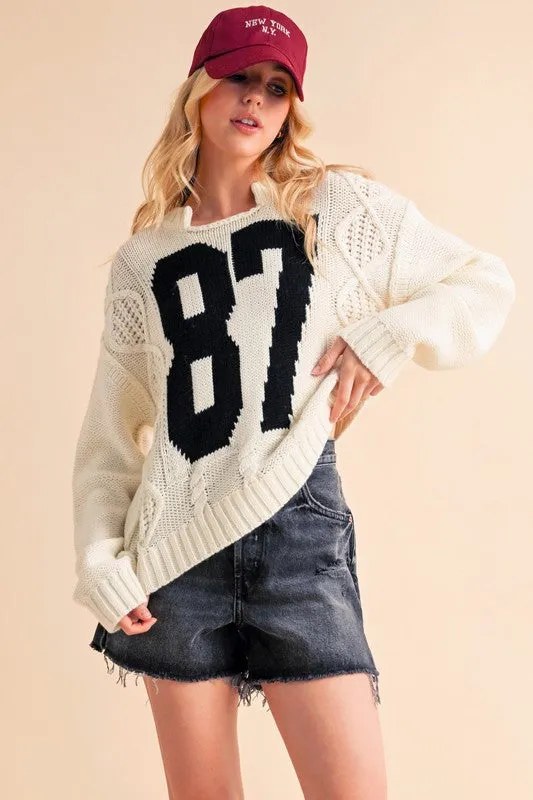 Aemi+Co Contrast Number Cable Knit Drop Shoulder Sweater sold by Charming Charlie product image thumbnail 4
