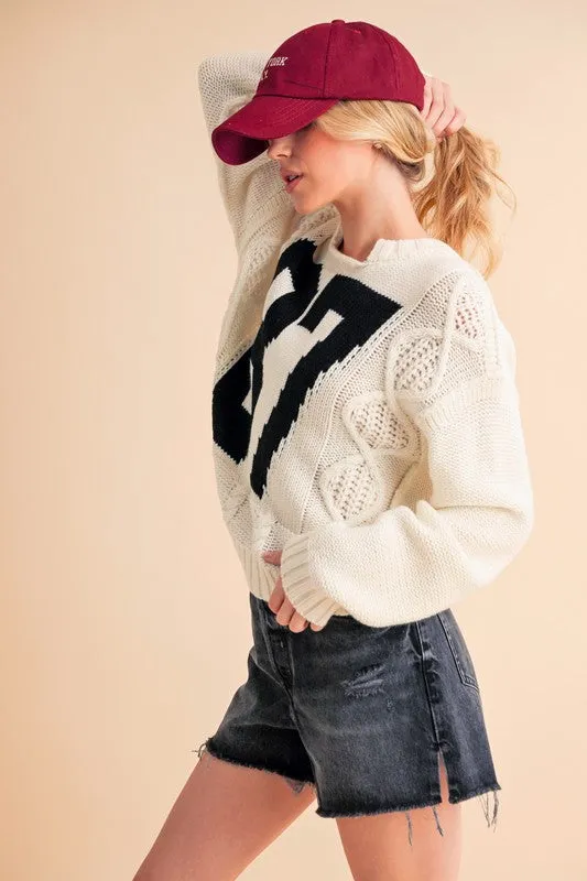 Aemi+Co Contrast Number Cable Knit Drop Shoulder Sweater sold by Charming Charlie product image thumbnail 3