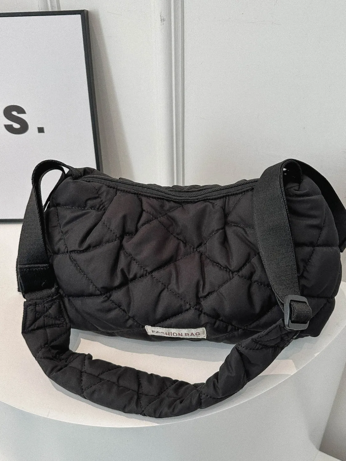 Bubble Texture Adjustable Strap Crossbody Bag sold by Charming Charlie