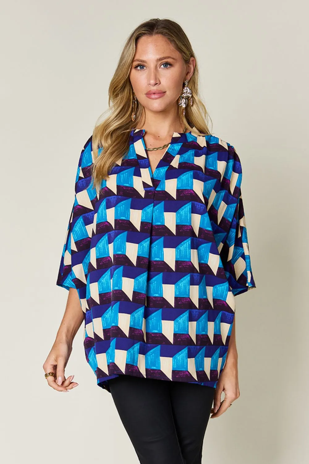 Double Take Full Size Geometric Notched Half Sleeve Blouse sold by Charming Charlie