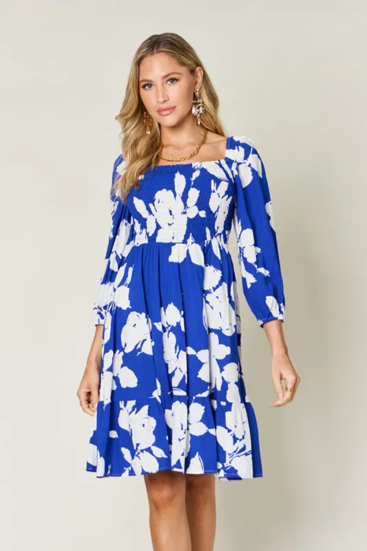 Double Take Full Size Floral Ruffle Hem Smocked Dress with Pockets sold by Charming Charlie