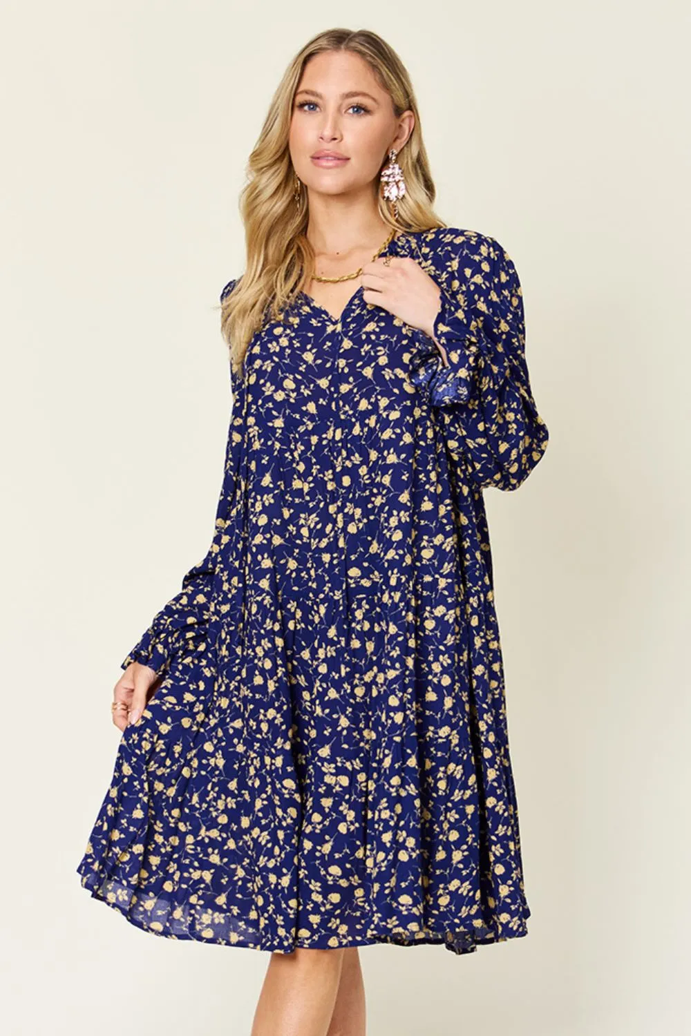 Double Take Full Size Printed Ruffle Hem Long Sleeve Tiered Dress sold by Charming Charlie
