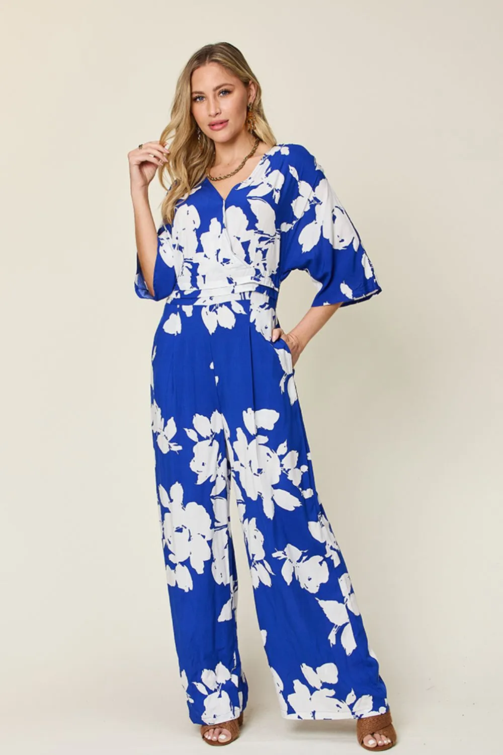 Double Take Full Size Printed Tie Back Wide Leg Jumpsuit sold by Charming Charlie