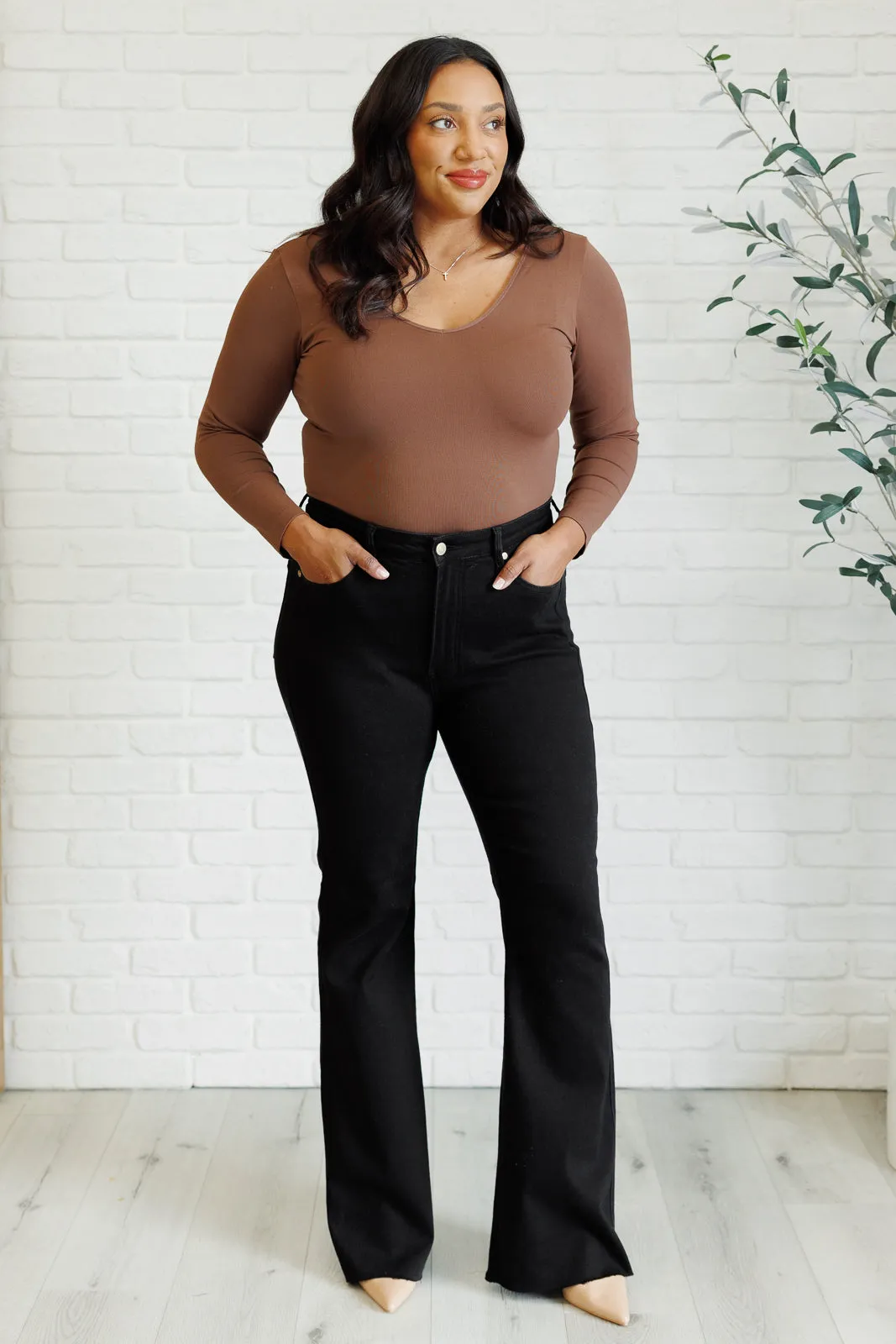 Etta High Rise Control Top Flare Jeans in Black sold by Charming Charlie product image thumbnail 3