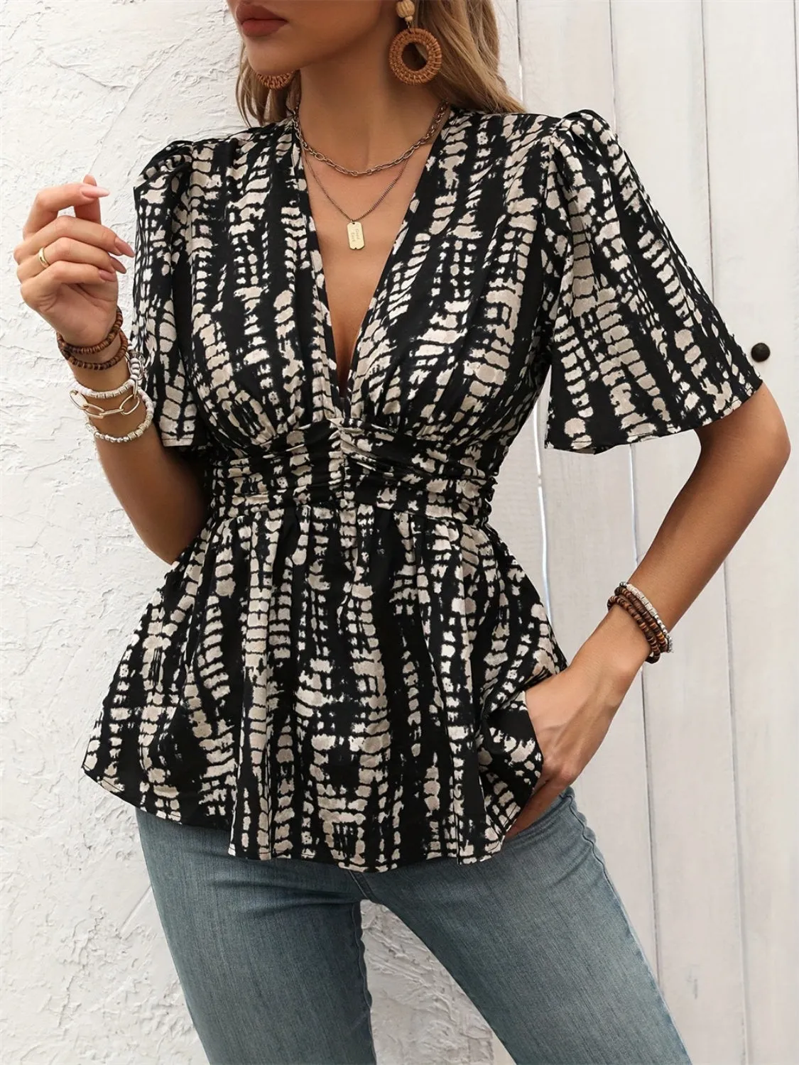Printed V-Neck Half Sleeve Blouse sold by Charming Charlie product image thumbnail 3