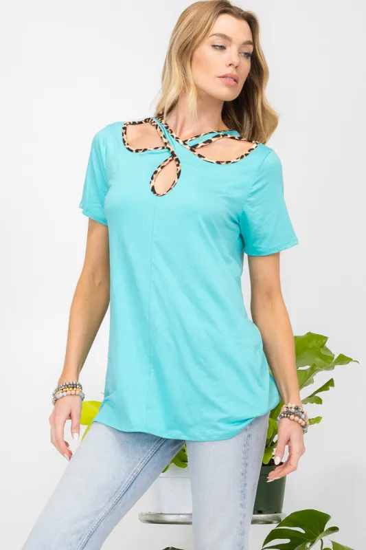 Celeste Full Size Crisscross Cutout Leopard Contrast Trim T-Shirt sold by Charming Charlie