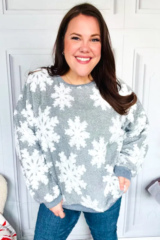 Season Greetings Silver Puffy Snowflake Sherpa Pullover sold by Charming Charlie
