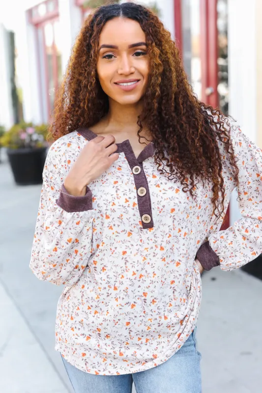 Lock Eyes Floral Hacci Button Henley Oversized Top sold by Charming Charlie