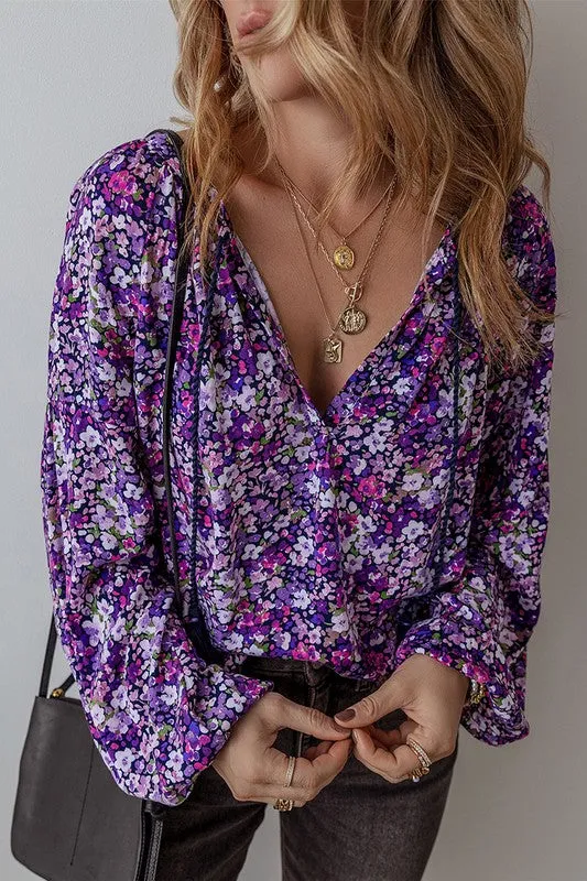 Boho Flower Split V Neck Bubble Sleeve Blouse sold by Charming Charlie